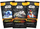 Three 'Star Wars Unlimited' trading card booster packs on a white background