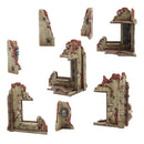 Set of miniature game terrain pieces on a white background