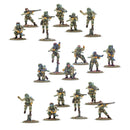 Set of miniature military figures in various poses on a white background