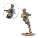 Toy soldier figure with detailed uniform and weapons on a white background
