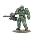 Green armored figurine holding a weapon on a white background