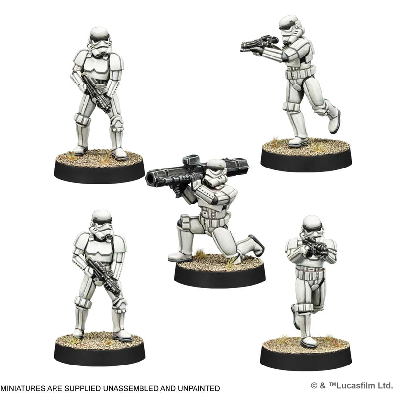 Five stormtrooper miniatures on round bases with a white background
