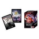 Two playing cards and a box of One Piece trading card game on a white background