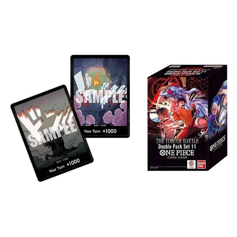 Two playing cards and a box of One Piece trading card game on a white background