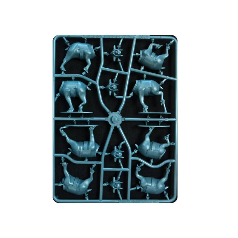 Set of plastic model parts on a black tray with a white background