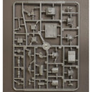 Plastic model kit components on a gray background