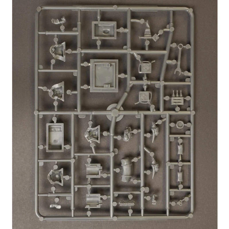Plastic model kit parts on a gray background