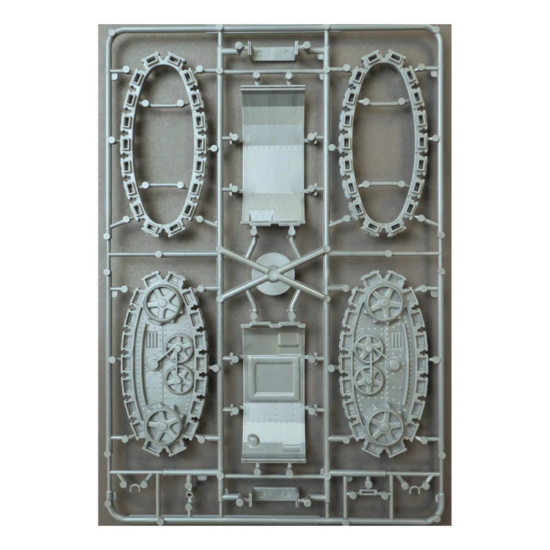 Model kit components on a gray background