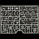Set of miniature model parts on a black background