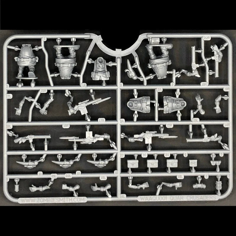 Plastic model kit parts on a black background