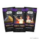 Three 'Star Wars: Unlimited' trading card game packs on a white background