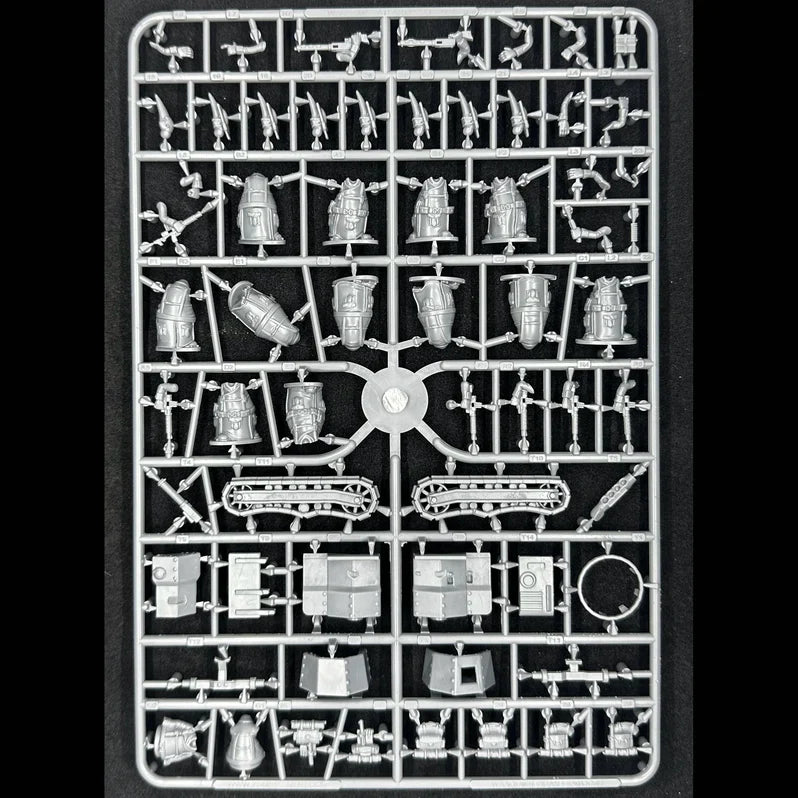 Plastic model kit parts on a black background