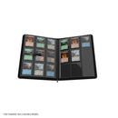 An open Magic: The Gathering trading card binder displaying multiple cards in protective sleeves, shown against a plain white background.