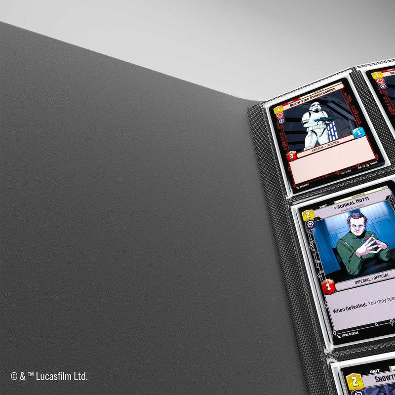 Card holder with trading cards featuring characters from a popular franchise on a gray background.