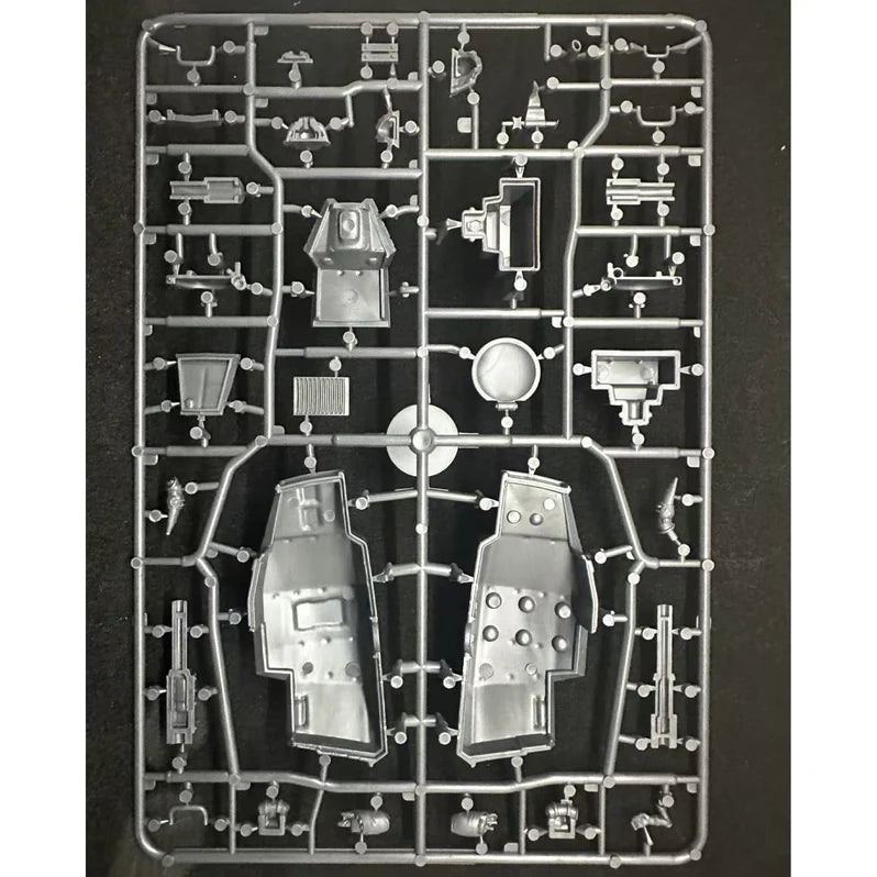 Model kit on a black background.