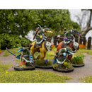 Miniature figures on horseback with armor and weapons in a natural setting