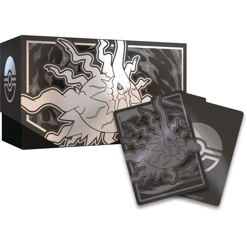 Pokémon trading card game packaging with cards and box featuring a dragon-like creature design.