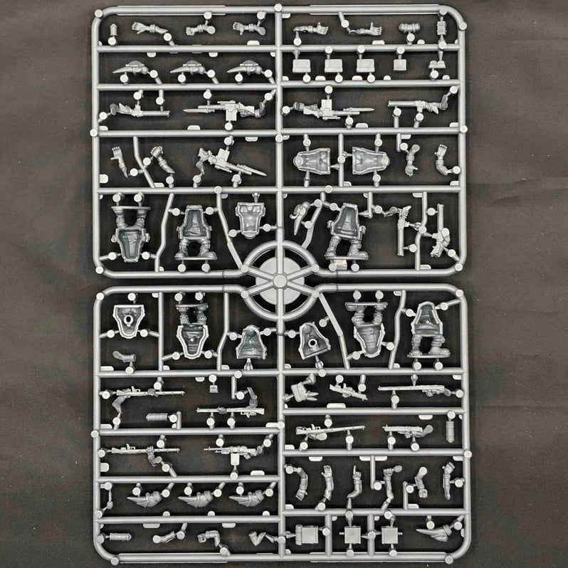 Set of small mechanical parts on a gray background