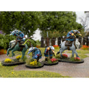 Miniature figures on horseback with weapons in a natural setting