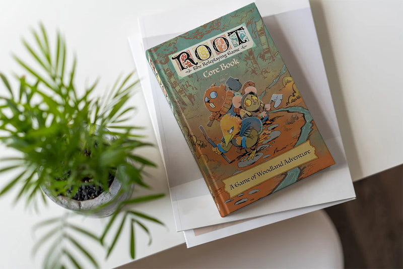 Book titled 'Root' on a white surface with a plant in the background