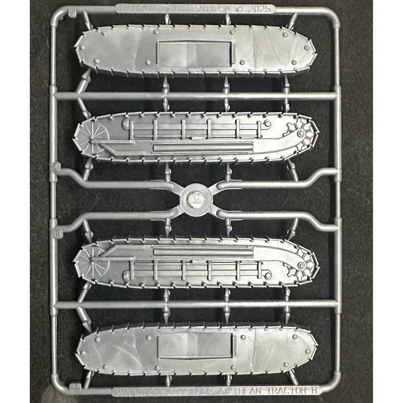 Set of model tank tracks on a black background