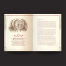 Open book with decorative cover and text on a dark background
