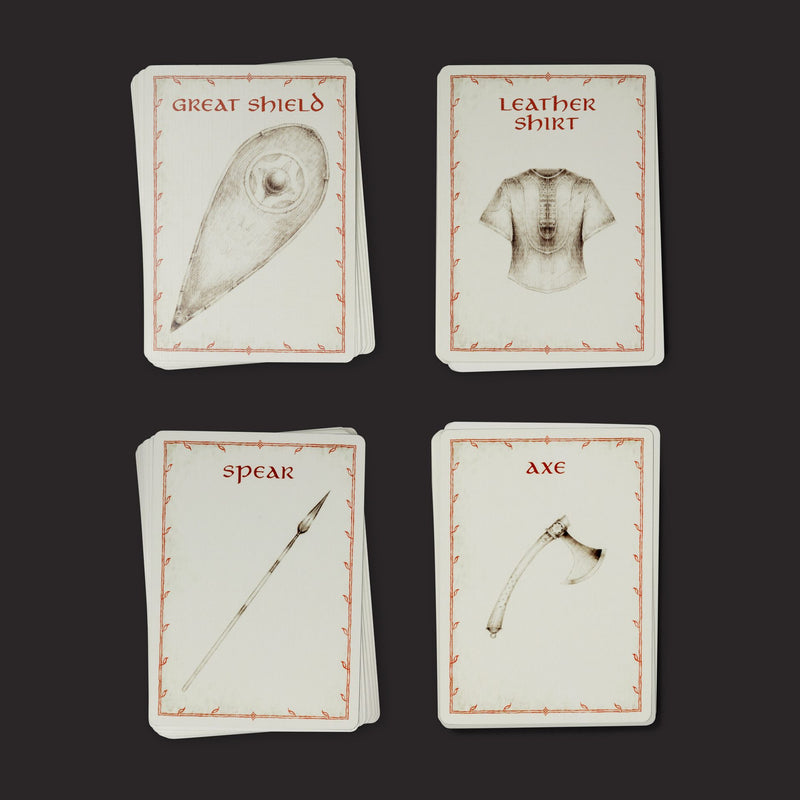 Four cards depicting armor and weapons with text labels on a dark background
