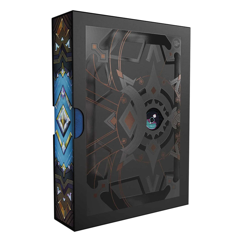 Decorative box with intricate patterns and a blue gemstone on a white background