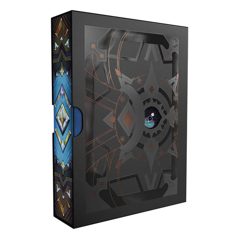 Decorative box with intricate patterns and a blue gemstone on a white background