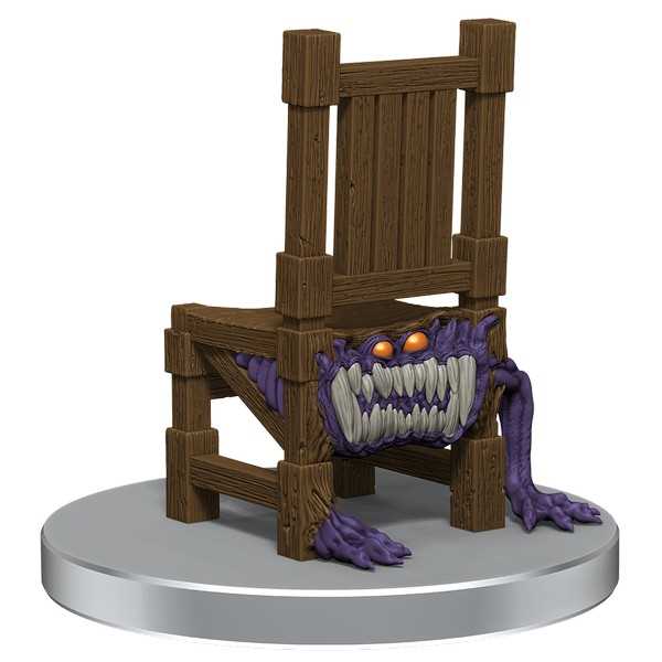 Wooden chair with a monster face on a white background