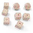 Set of wooden dice with red numbers on a white background