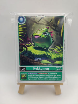 Trading card featuring a green creature named Kekkomon on a white background