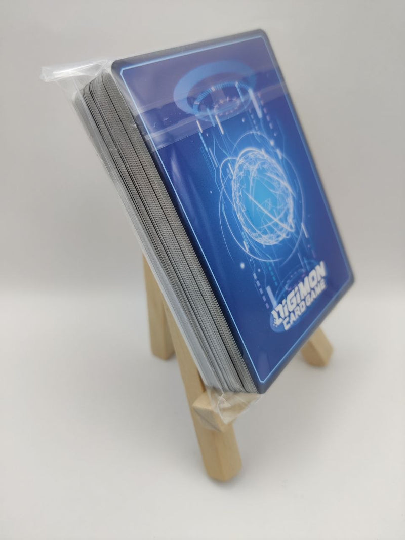 Collection of trading cards with a blue card featuring 'Digimon' text on a white background