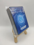 Digimon trading card deck on a small wooden stand with a white background