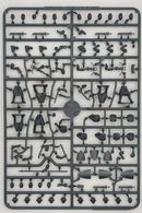 Plastic model kit with various small parts on a gray background