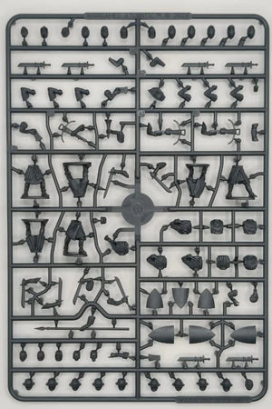 Plastic model kit with various small parts on a gray background