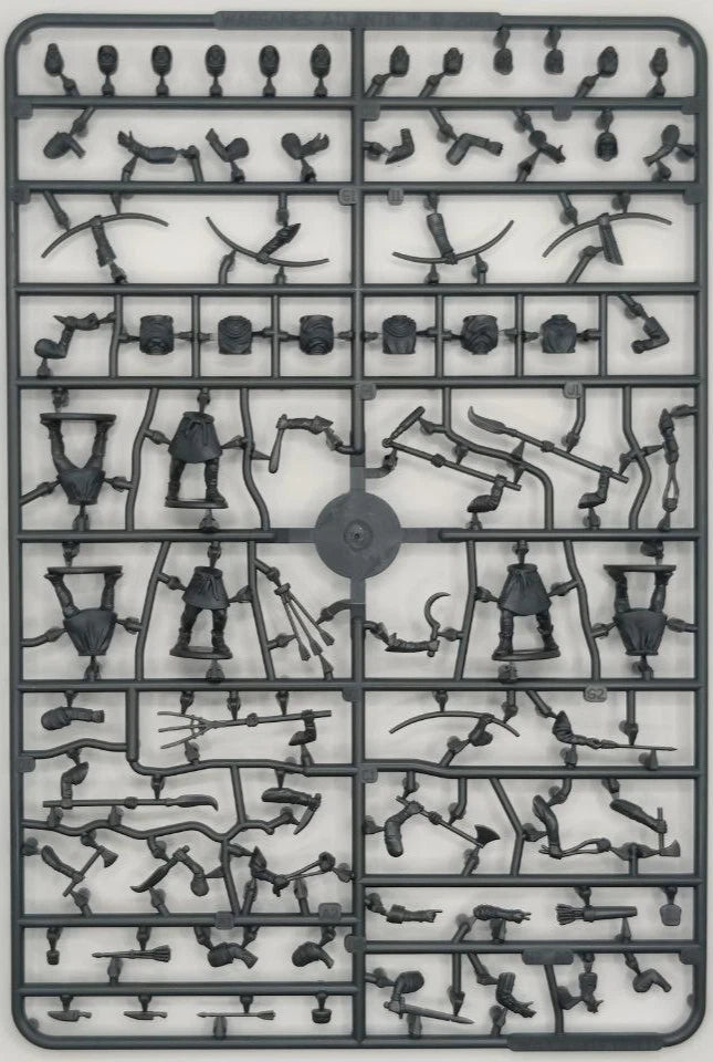 Plastic model kit parts on a gray background
