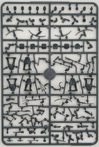 Plastic model kit parts on a gray background