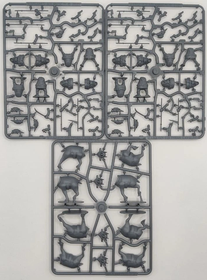 Plastic model kit with various pre-assembled parts on a white background