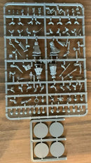 Set of plastic figurine molds on a wooden surface