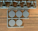 Model kit parts on a wooden surface