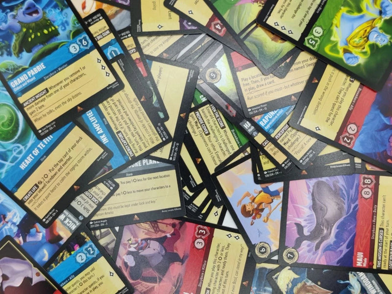 A pile of mixed Lorcana rare cards.
