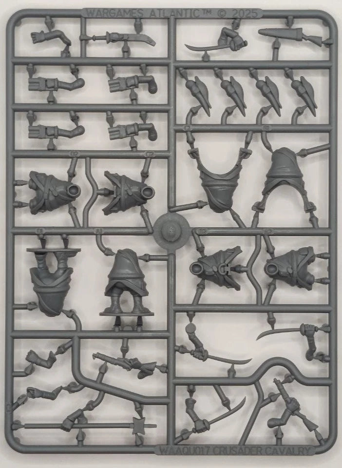 Plastic model parts on a gray background