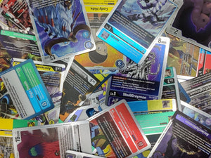 A pile of random Digimon rare cards.