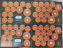 Star Wars Unlimited trading card token sheets with orange and gray tokens on a black background.