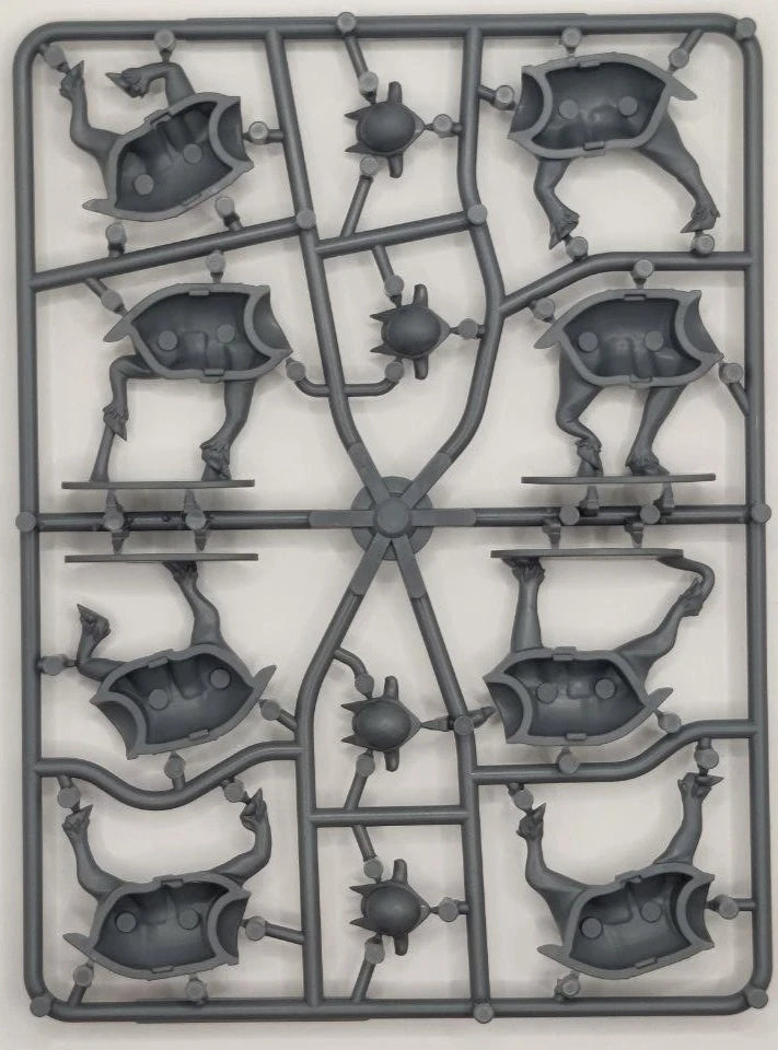 Plastic model kit with multiple poses of a character on a white background