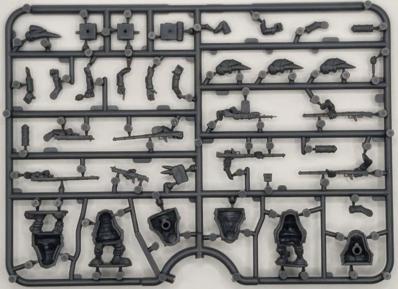 Plastic model parts on a gray background