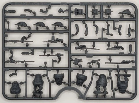 Plastic model kit parts on a gray background