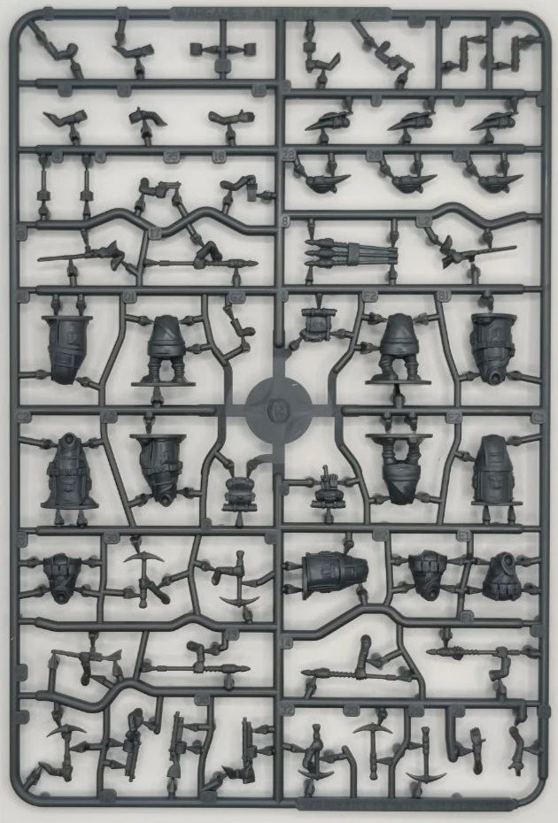 Plastic model kit parts on a gray background