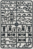 Plastic model kit with various parts on a gray background